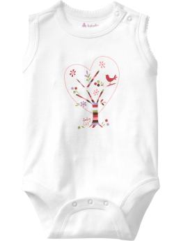 Soft knit pre-washed cotton. - Sleeveless with picot trim at arm holes and neckline. Print or embroidered graphics at center. Snaps at shoulder and at bottom. Tagless.