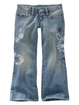 Flared embroidered distressed jeans