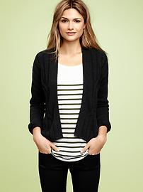 Traveling cable knit sweater