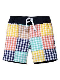Gingham patchwork swim trunks