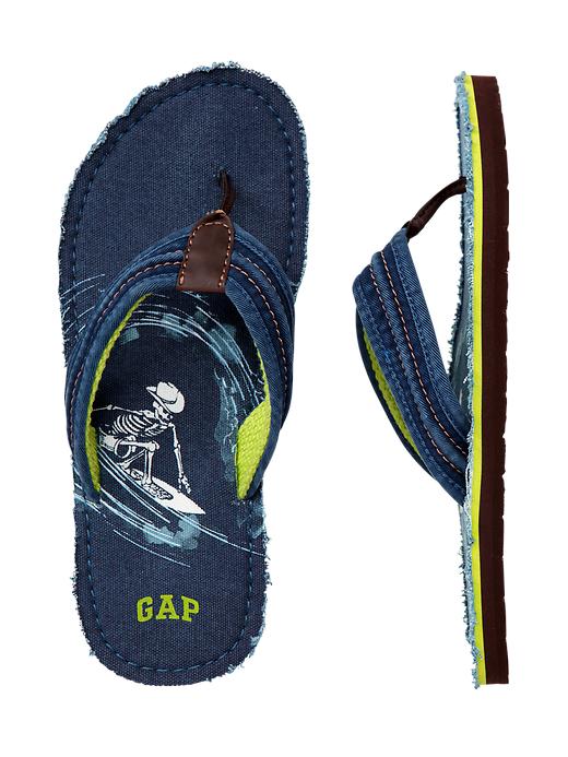 View large product image 1 of 1. Surf graphic flip flops