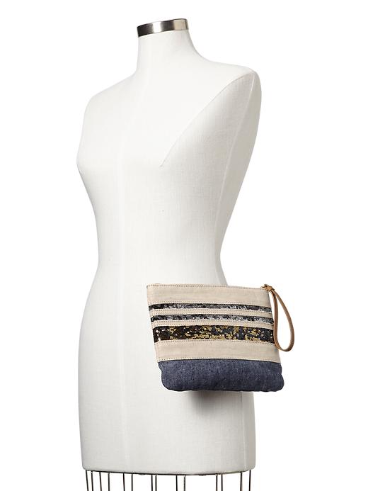View large product image 2 of 3. Sequin stripe zip clutch