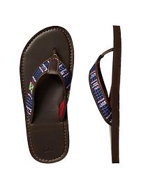 Woven striped flip flops
