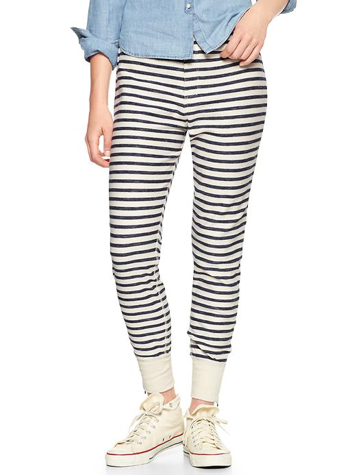 View large product image 1 of 1. Striped ankle-zip track pants