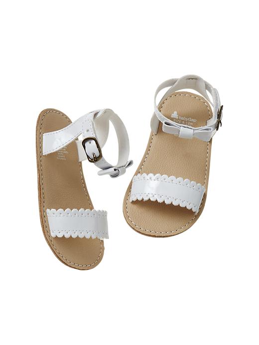 View large product image 1 of 1. Scalloped bow sandals
