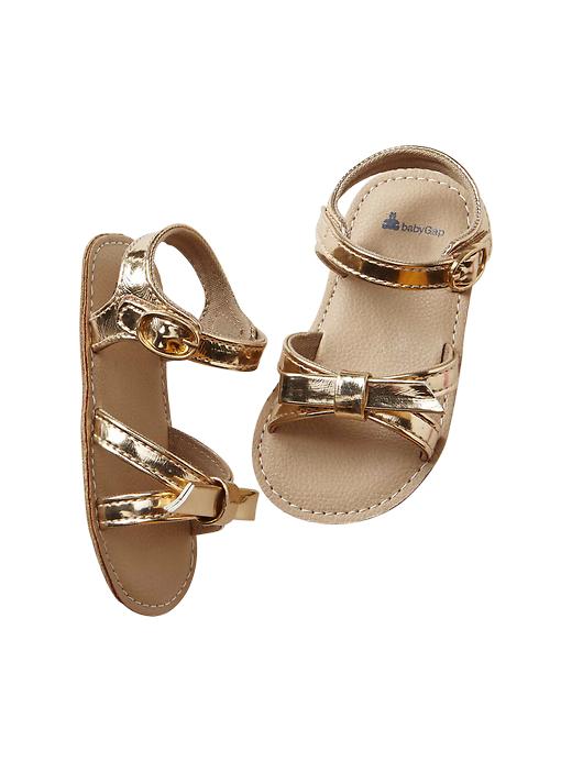 View large product image 1 of 1. Metallic knot sandals