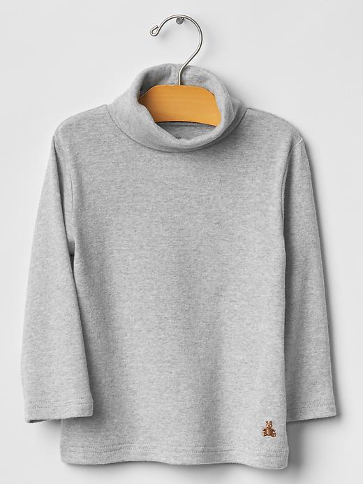View large product image 1 of 1. Solid turtleneck