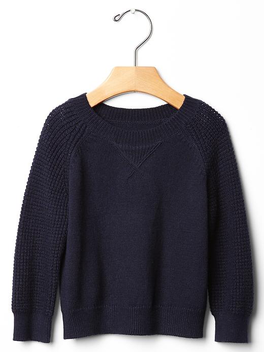 View large product image 1 of 1. Waffle knit raglan sweater