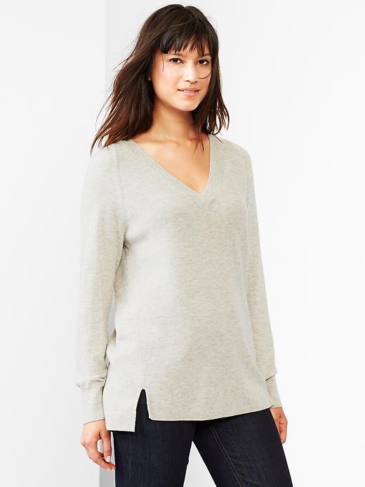 View large product image 1 of 1. V-neck raglan sweater