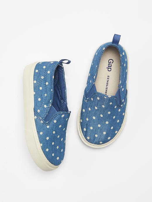 View large product image 1 of 1. Chambray dot slip-on sneakers