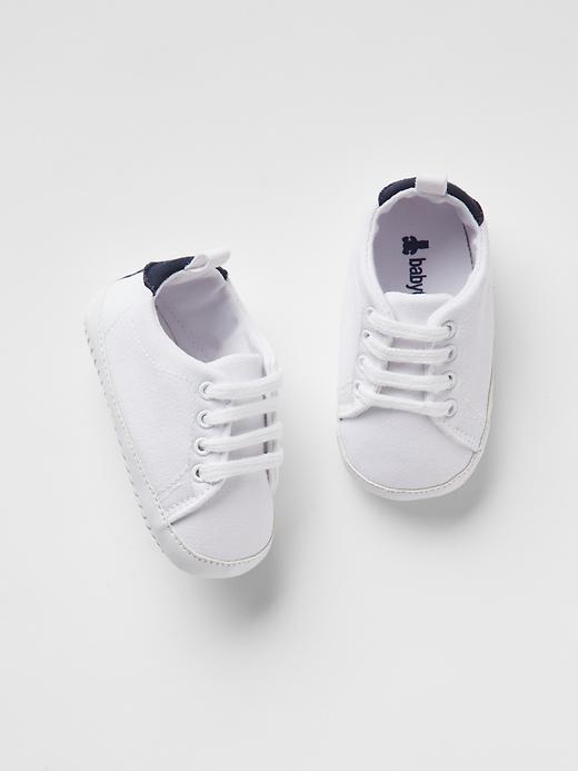 View large product image 1 of 1. Lace-up sneakers