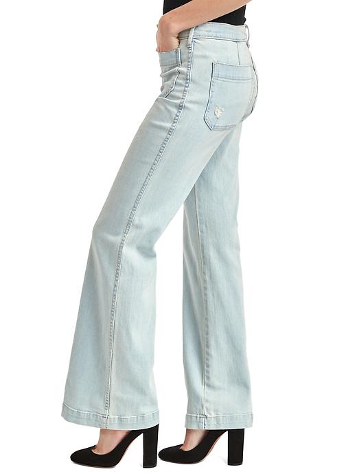 Image number 3 showing, Mid rise distressed flare jeans