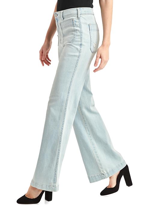 Image number 6 showing, Mid rise distressed flare jeans