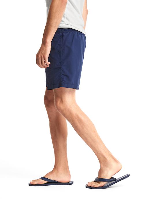 Image number 5 showing, Solid swim trunks (5.5")