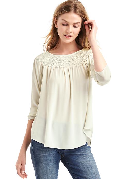 View large product image 1 of 1. Smock neck long sleeve blouse