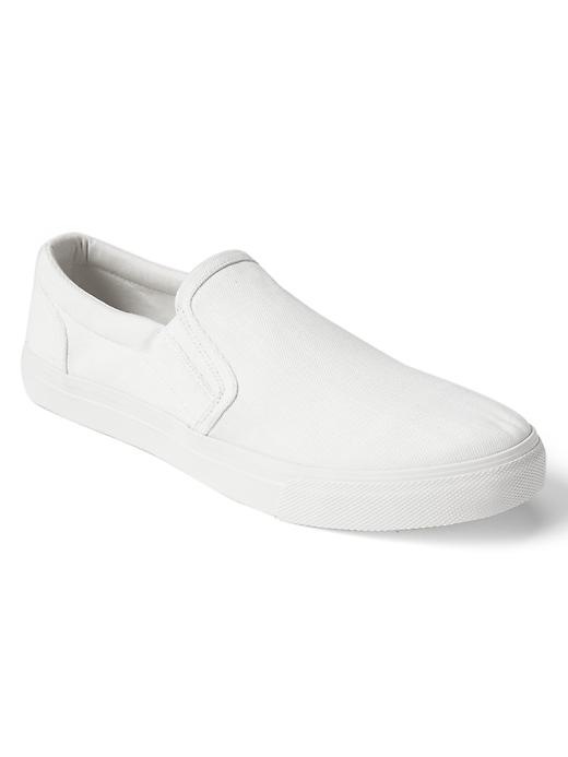 View large product image 1 of 1. Denim slip-on sneakers