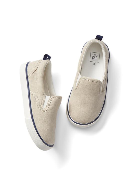 View large product image 1 of 1. Woven slip-on sneakers