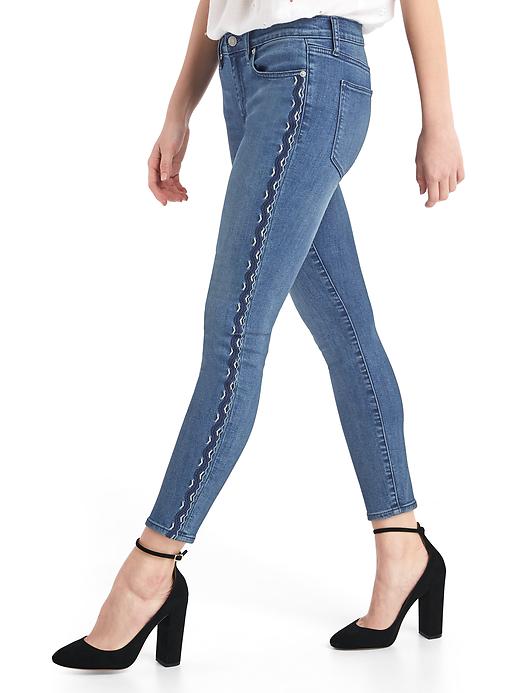 Image number 6 showing, Mid rise embroidered true skinny ankle jeans
