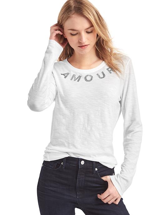View large product image 1 of 1. Amour studded graphic long sleeve tee