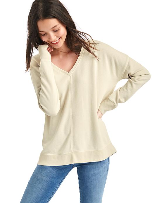 View large product image 1 of 1. French terry V-neck tunic sweater