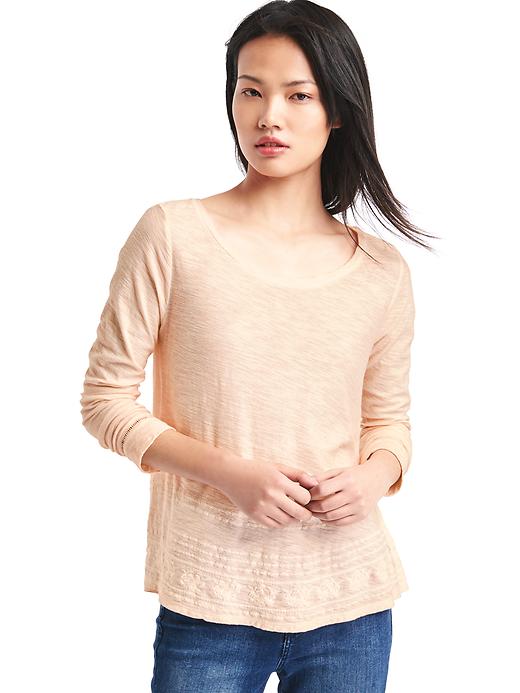 View large product image 1 of 1. Embroidered long sleeve swing top