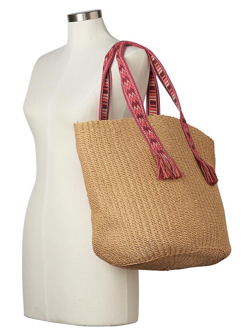 View large product image 2 of 3. Web handle straw tote