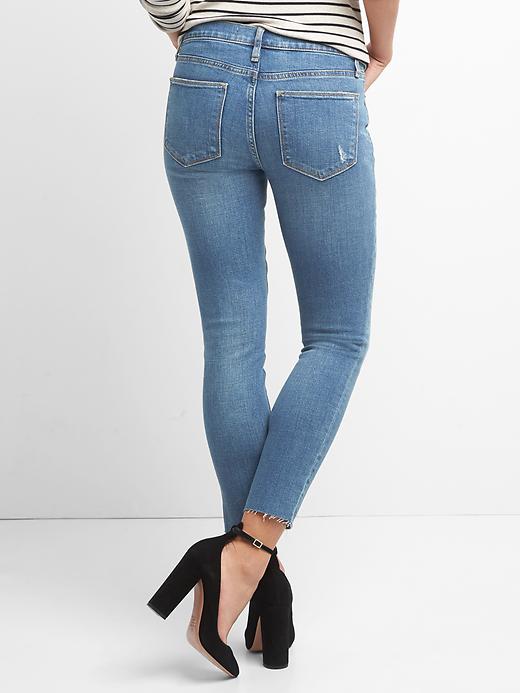 Image number 2 showing, Mid rise distressed true skinny ankle jeans