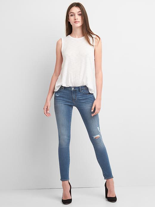 Image number 3 showing, Low Rise True Skinny Jeans with Destruction