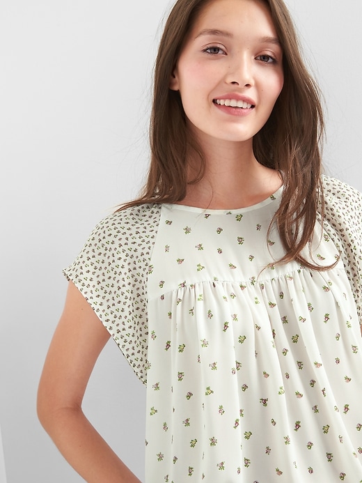 View large product image 1 of 1. Floral flutter top