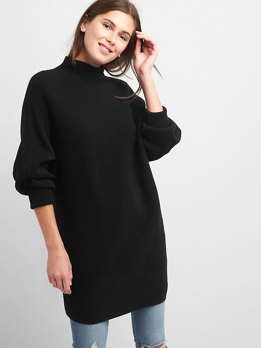 View large product image 1 of 1. Mockneck batwing tunic