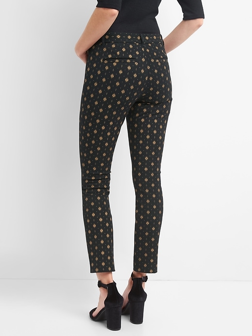 Image number 2 showing, Gold print skinny ankle pants