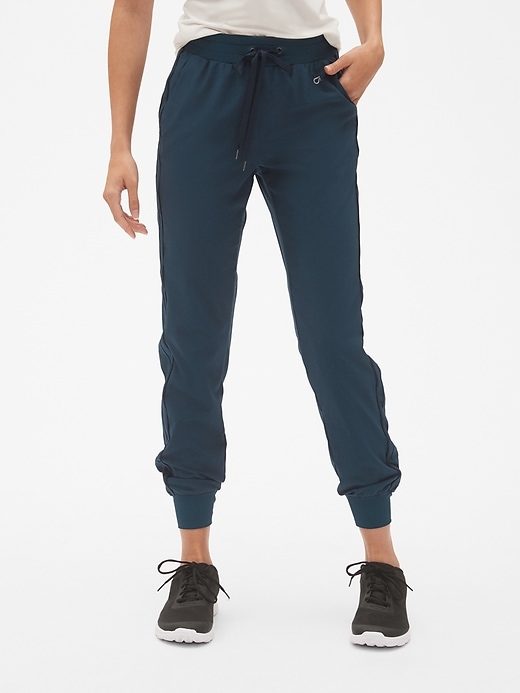 View large product image 1 of 1. GapFit Studio Side-Stripe Joggers