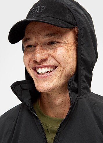 Man in a hoodie and ballcap