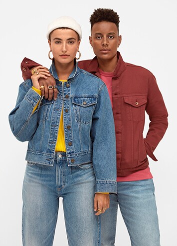 Couple wearing different color denim jackets and jeans