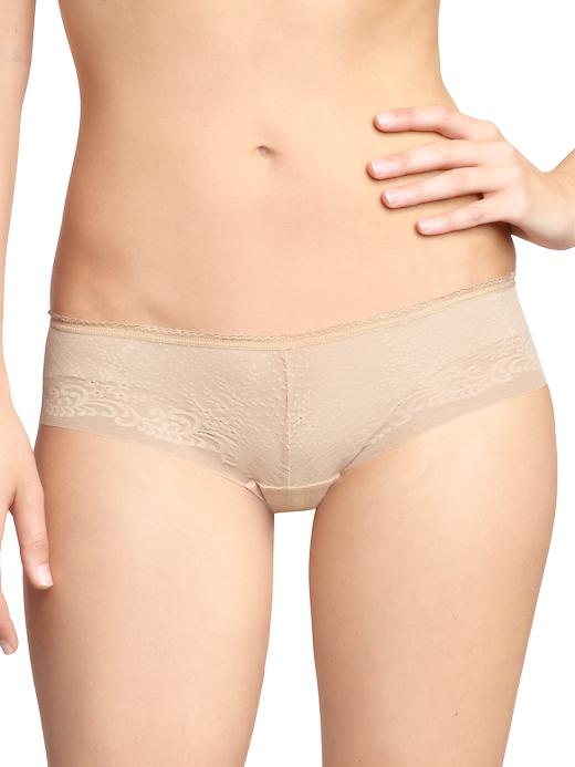 1 of 8 showing, with the color new nude of product Sexy Invisibles tanga