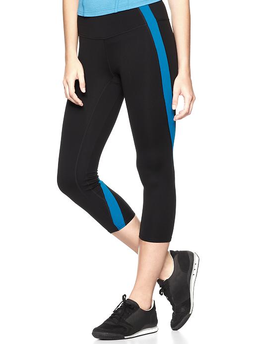 1 of 8 showing, with the color black & skater blue of product GapFit gFast colorblock capris