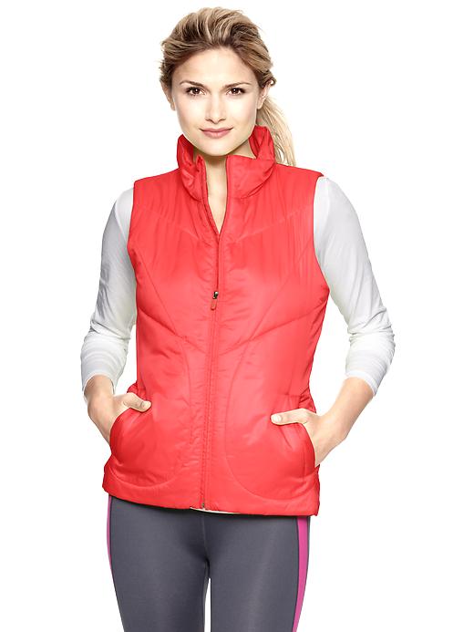 1 of 8 showing, with the color neon coral of product GapFit PrimaLoft® puffer vest