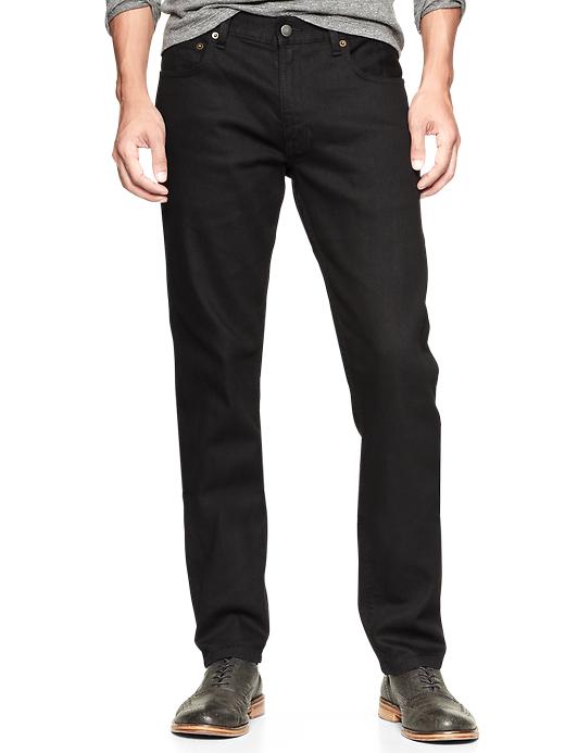 1 of 8 showing, with the color black rinse of product Gap x GQ BLK DNM Slim Fit Jeans