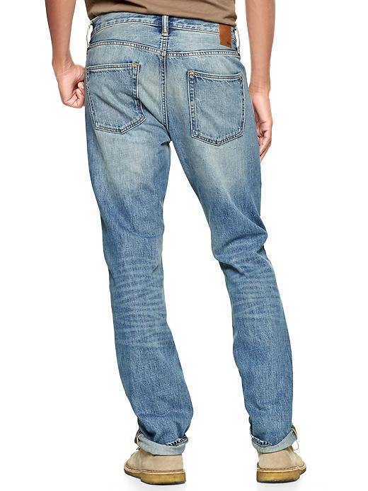 2 of 8 showing, with the color light destruction of product 1969 slim fit jeans (light destruction)