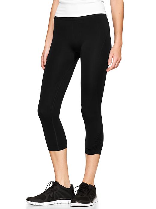 1 of 8 showing, with the color true black of product GapFit Motion capris