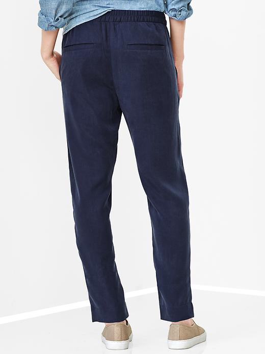 2 of 8 showing, with the color military blue of product TENCEL™ track pants