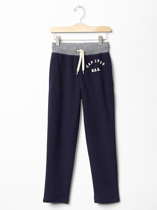 1 of 8 showing, with the color dark night of product Logo slim sweats