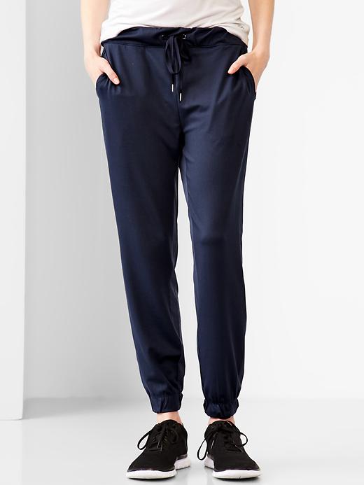 1 of 8 showing, with the color navy uniform of product GapFit Studio jogger pants