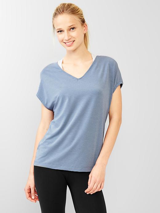 1 of 8 showing, with the color elite blue of product GapFit Breathe double-V tee