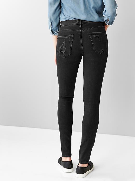 2 of 8 showing, with the color washed black of product 1969 destructed resolution true skinny high-rise jeans