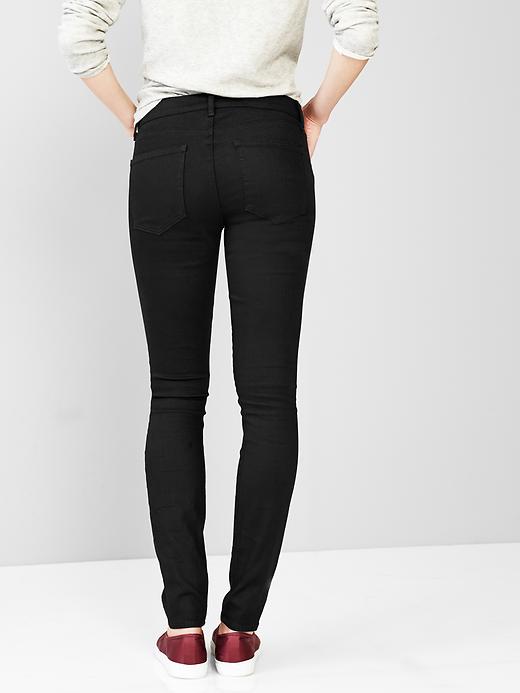 2 of 8 showing, with the color matte black of product STRETCH 1969 true skinny jeans