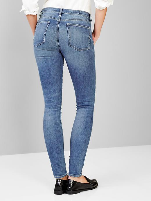 2 of 8 showing, with the color medium vintage of product STRETCH 1969 true skinny jeans