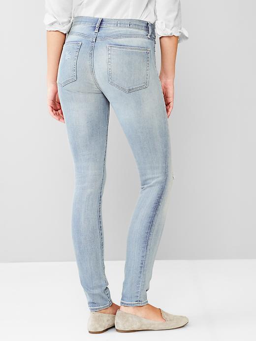 2 of 8 showing, with the color light authentic of product 1969 destructed resolution true skinny jeans