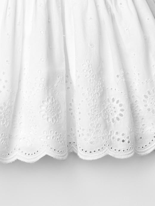 View large product image 2 of 2. Eyelet flutter top