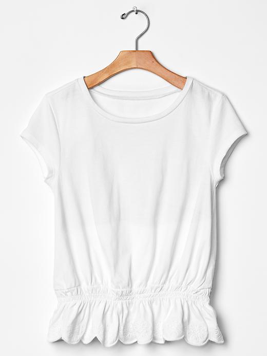 1 of 8 showing, with the color white of product Embroidered peplum tee